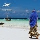 אישה-בלבוש-מקומי-על-החוף-בזנזיבר-טנזניה